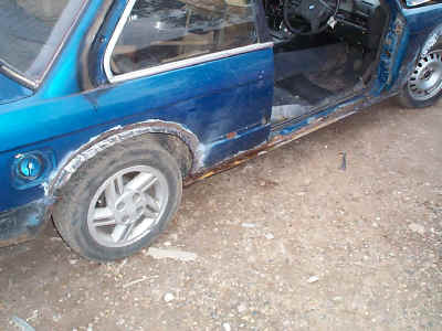 Rear arch reprofiled and welded for big wheels