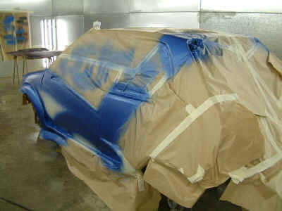 Blue coat on and drying